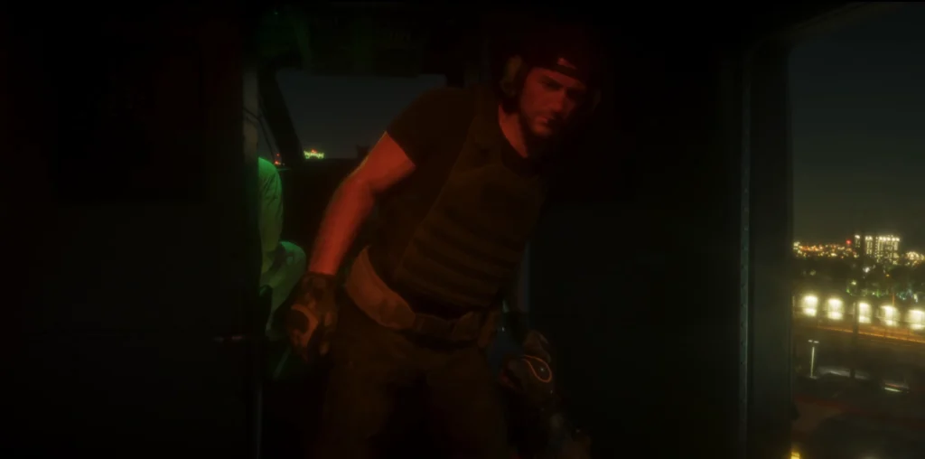 Jason wearing tactical gear inside an aircraft cabin at night, with city lights visible outside, in the GTA 6 launch trailer.