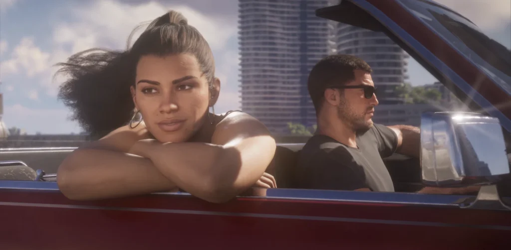 Lucia sitting in a convertible with Jason beside her in the GTA 6 launch trailer.